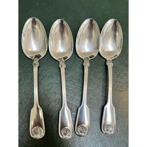 Reed & Barton Colonial Shell stainless-steel oval soup/place spoons.